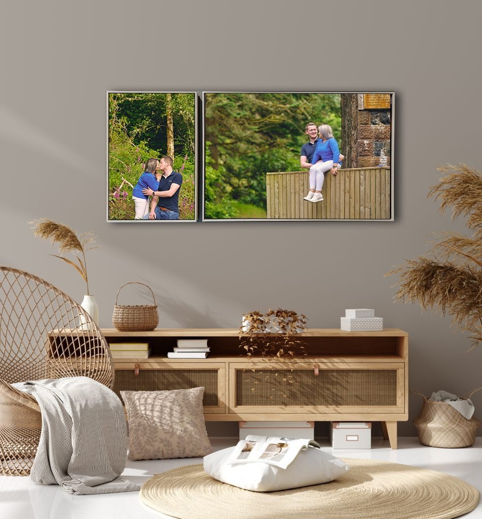 Family Photographer A living room with two pictures hanging on the wall, featuring family portraits.